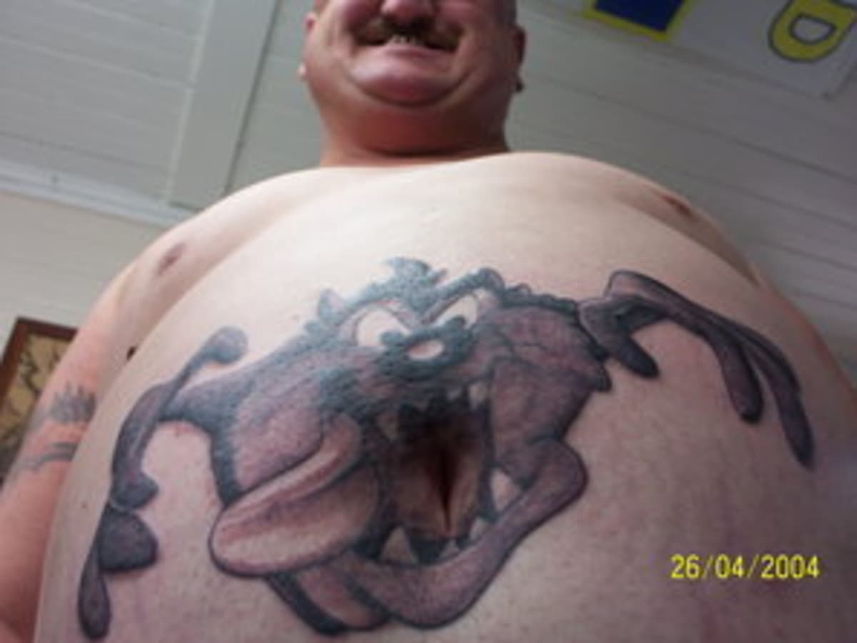 pigeon belly button tattoo