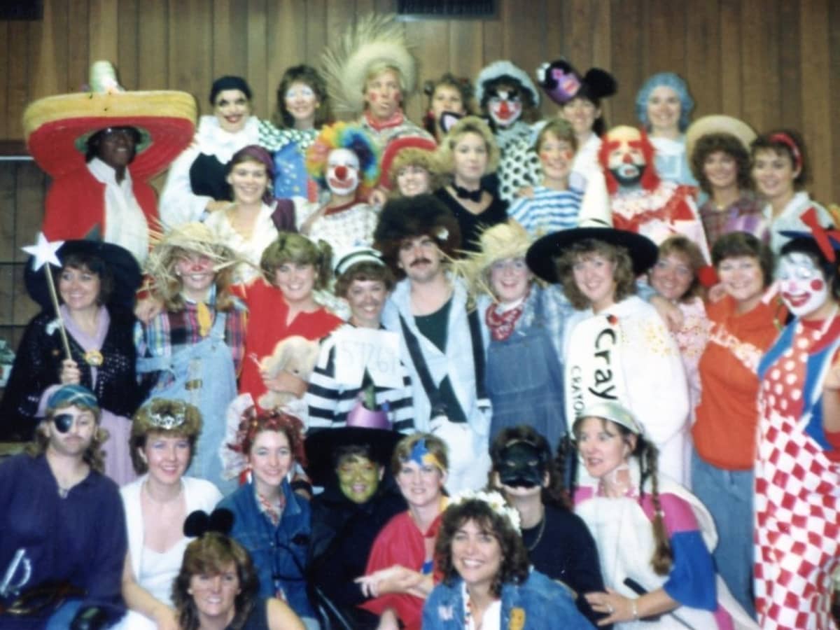 Group of people wearing masquerade masks at a party on Craiyon