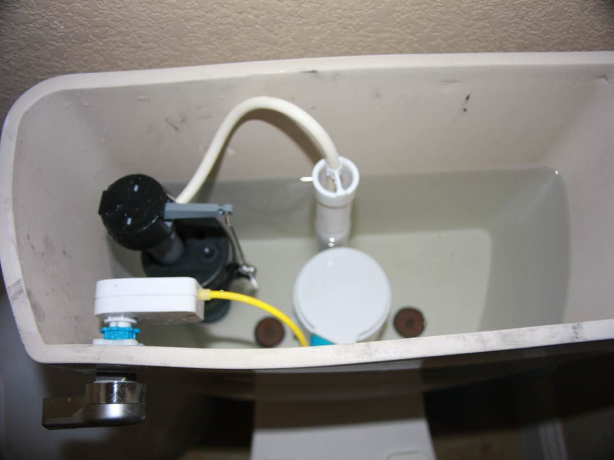 How does a dual toilet flush work?