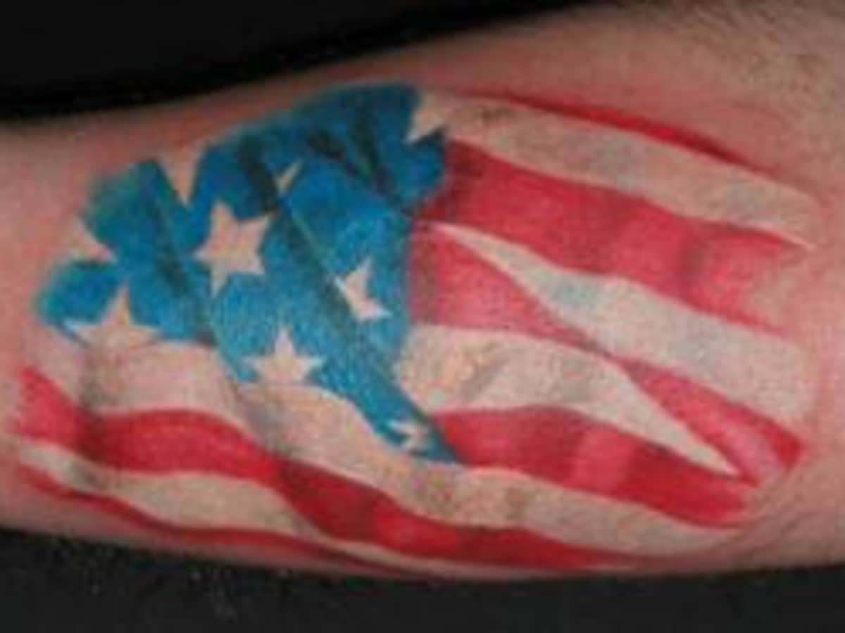 Tattered American Flag Tattoo on Men Hand  Tattoos Era