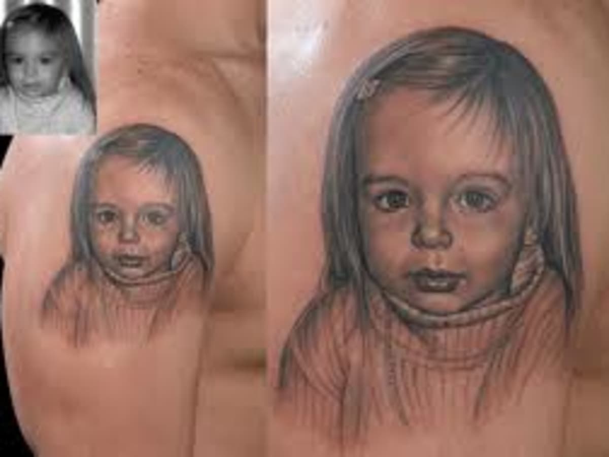 Young dad gets HUGE tattoo of his baby's face...on his face - Mirror Online