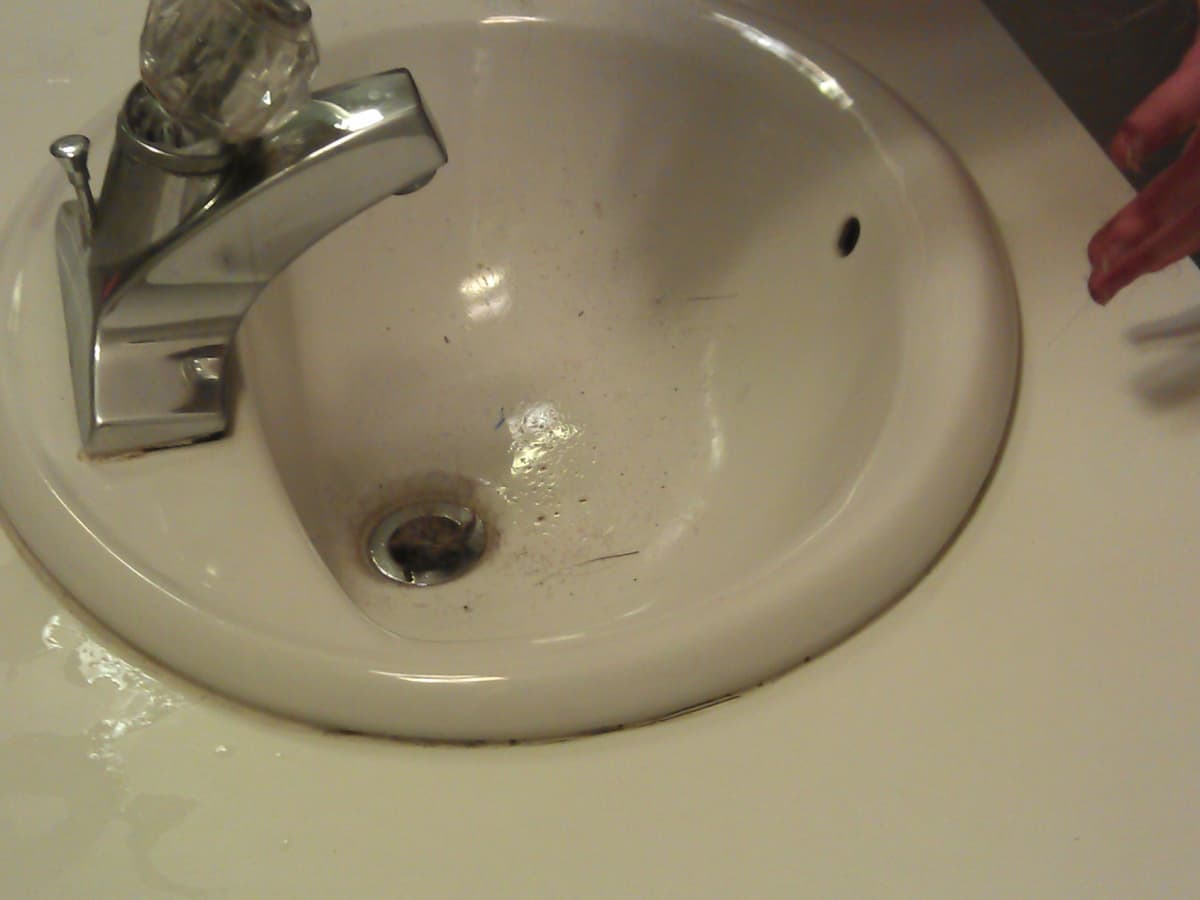 The Drano plus snake is stuck in my shower drain. Pouring the Drano down  and then boiling water hasn't helped. What should I do? : r/Plumbing