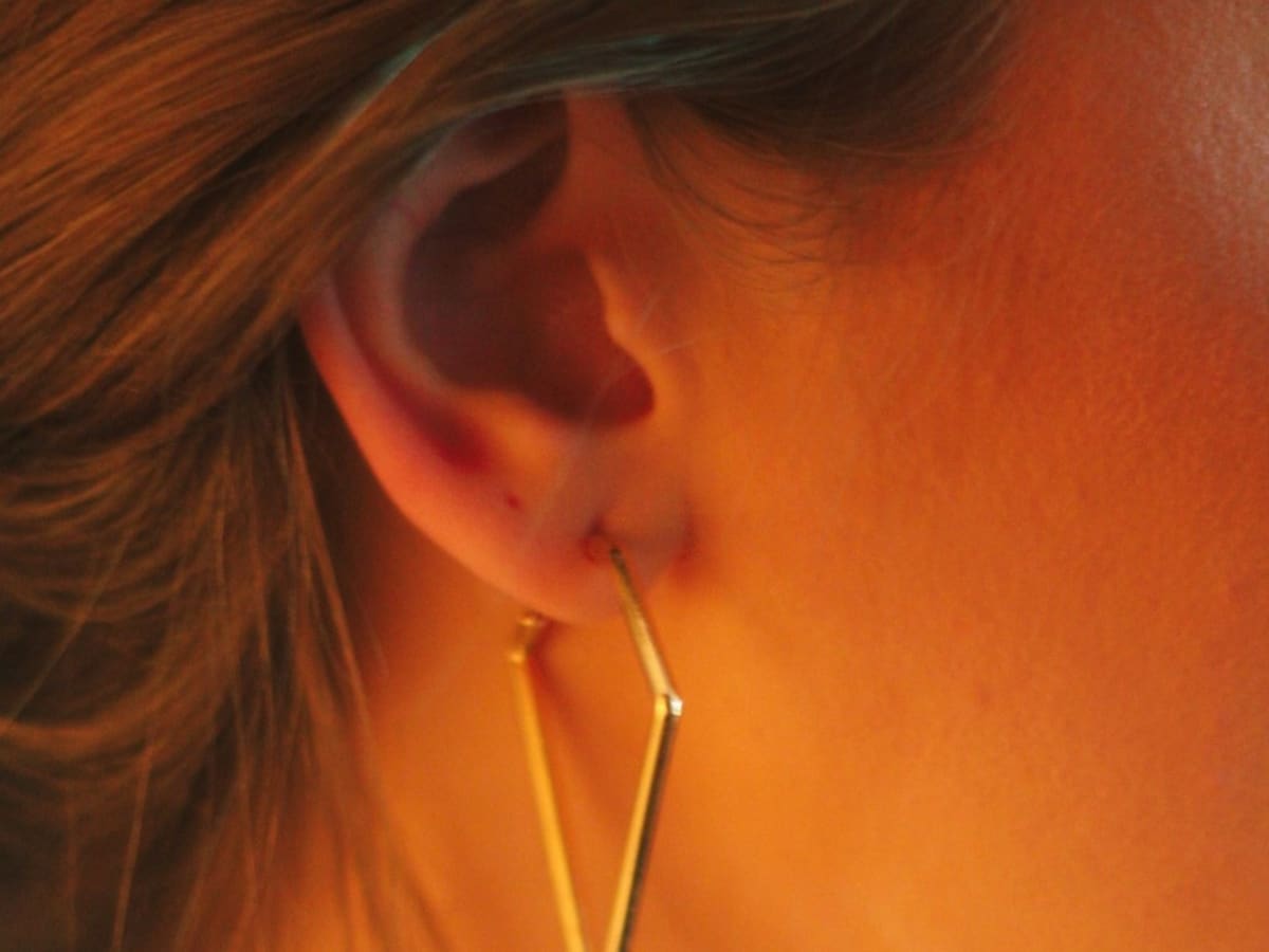 Infected Ear Piercing: What It Looks Like, Signs, And Treatment
