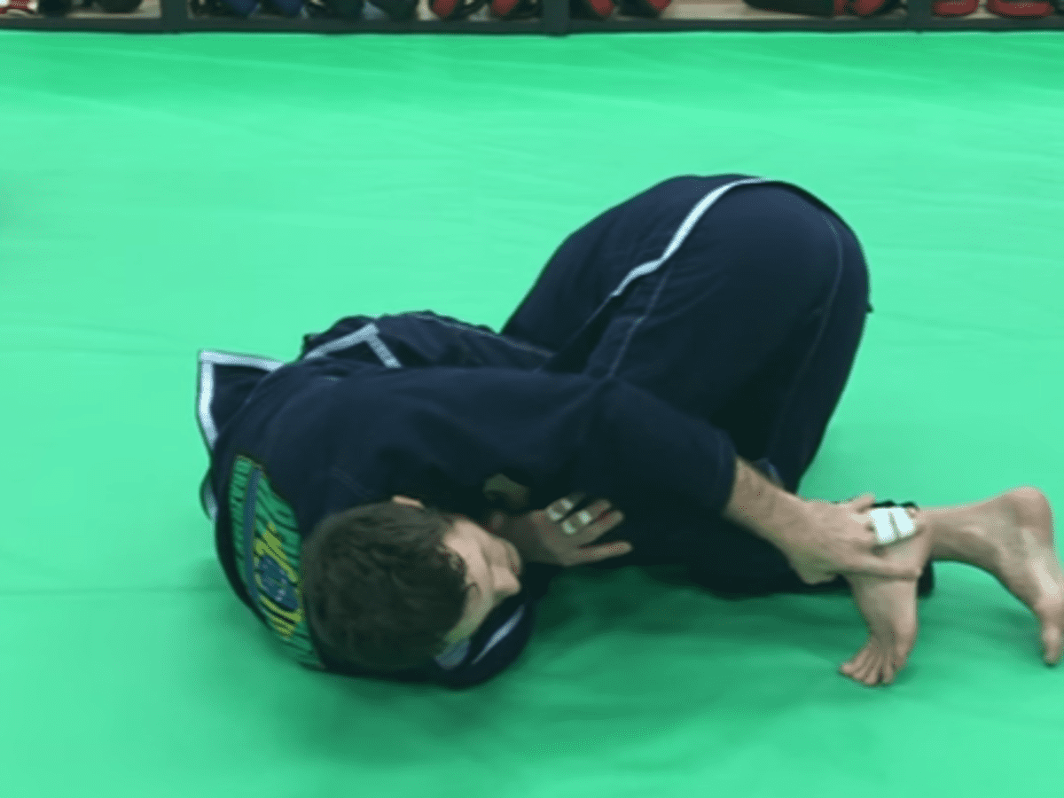 How to Do a Belly-Down Armbar From Guard in BJJ - HowTheyPlay