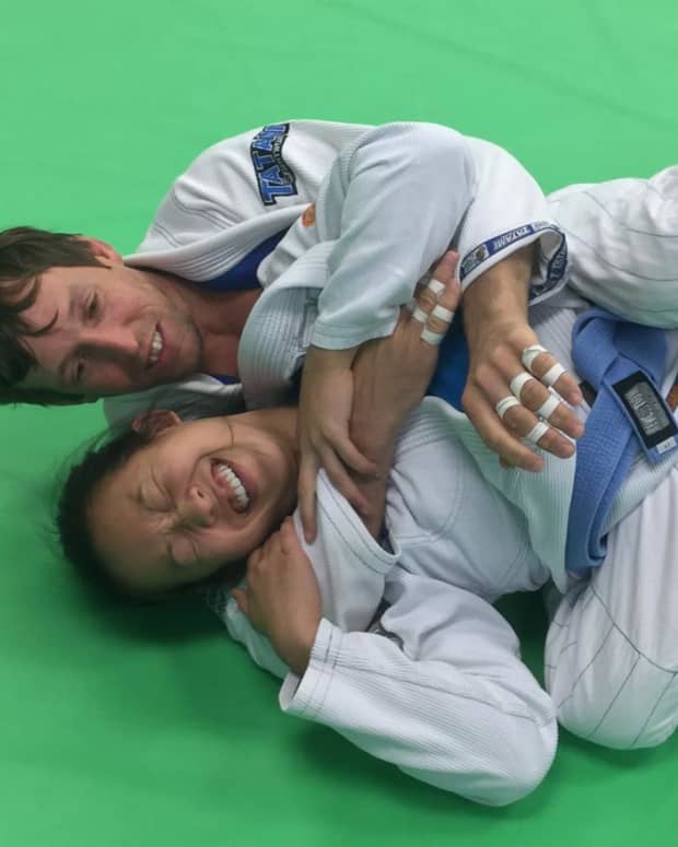 the-crunch-and-turn-basic-back-escape-a-bjj-tutorial