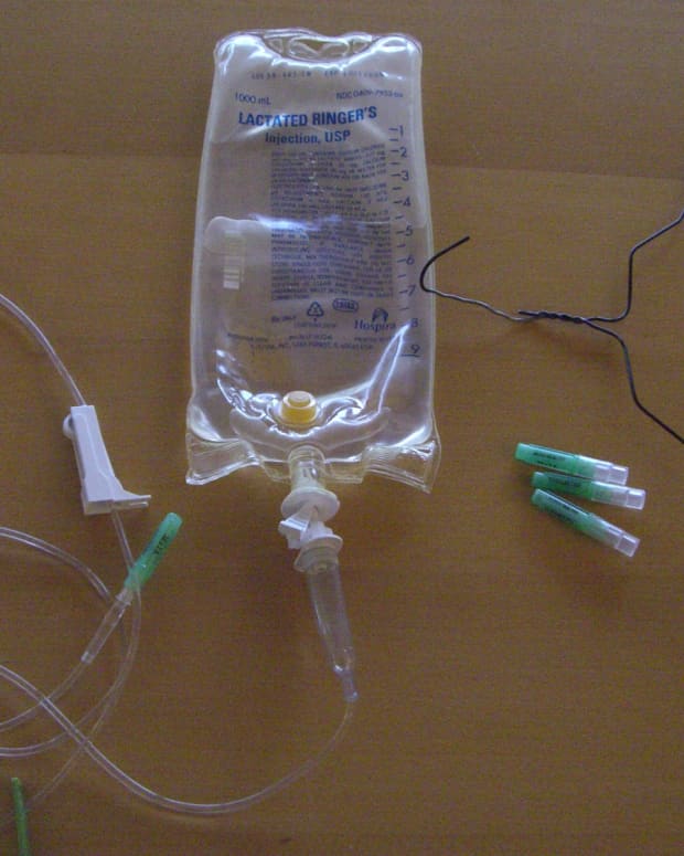 A bag of fluid connected to a drip line, needles and a coat hanger will do the job.