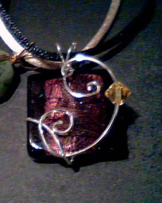 Dichroic glass with swarovski crystal in sterling silver, and faceted jade pendant in 14k gold