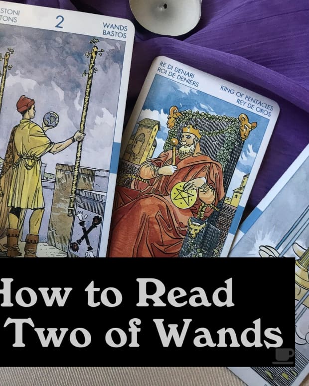 the-two-of-wands-in-tarot-and-how-to-read-it