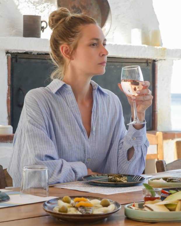 A woman dining alone at a restaurant