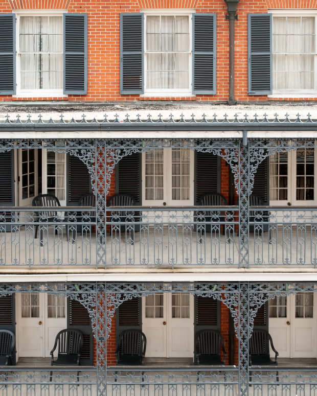 Ironwork on the facade of a French Quarter hotel in New Orleans