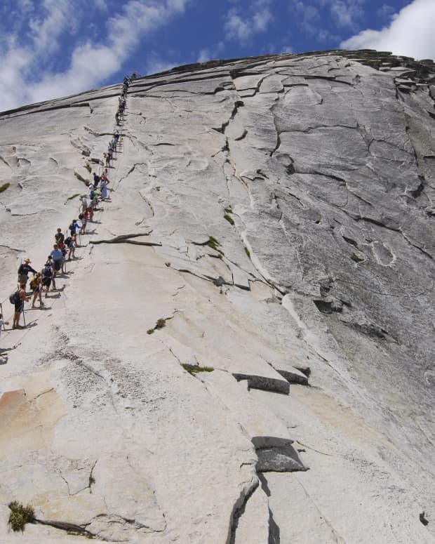 The roped-in hiking path up Yosemite's Half Dome, crowded with tourists