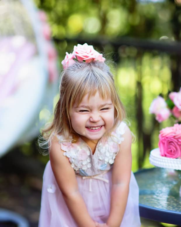 little girl with birthday cak