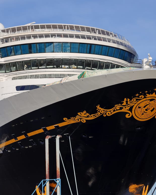 Disney Wish cruiseliner moored at a shipyard