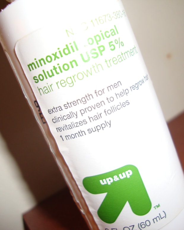 how to apply minoxidil liquid to long hair