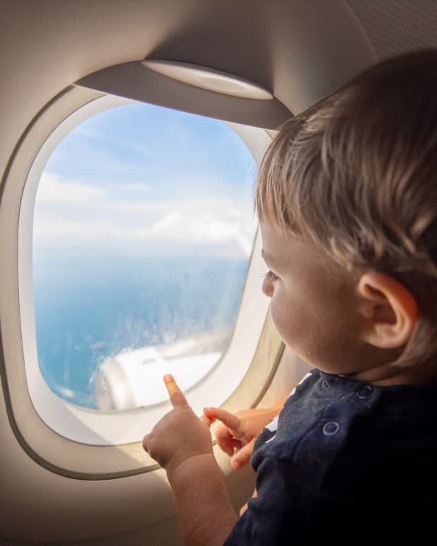 toddler flying on a plane