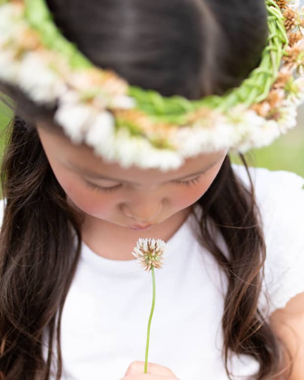 little girl wearing flower crown