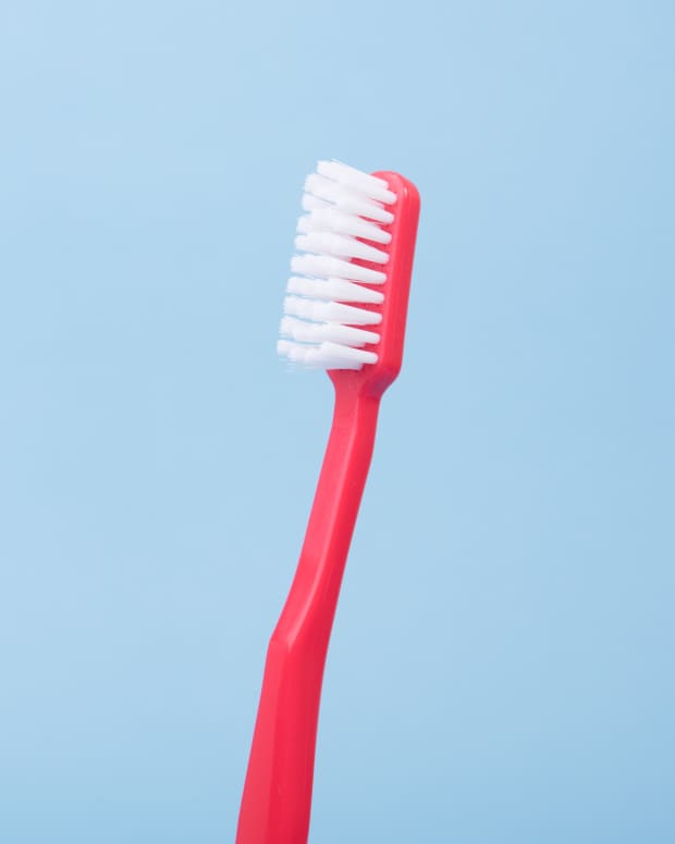 red tooth brush