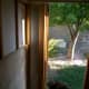 Insulation in the narrow strip on the hinge side of the door