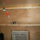 Completed shelf. Notice there is about a two inch gap between the shelf and the back wall so the AC plug can fit easily behind the shelf.