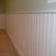 Traditional white wainscoting courtesy of www.bluewatercustom.com