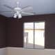 This is our home office before any furniture was moved in. Its simple design has a chair rail at traditional height with light brown on the bottom and chocolate brown on top.
