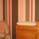 Different shades of pink and brown are combined to create this striped wall. Photo courtesy of bentleyteam.blogspot.com