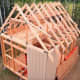 The upper area of the wall siding will be easy to nail into place without the roof sheathing.