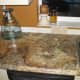 It's hard to tell that they are not granite! Now we need to do the tumbled stone backsplash...