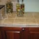 Straight-laid tile with "fancy" edge tile.
