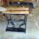 Folded legs for a lower work surface. Perfect for tall work.
