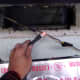 Checking the power - this wire is hot and must be shut off at the circuit breaker. The lower area with silver tape is the "up" side of the old fan.