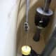 An example of a tangled chain keeping the valve from sealing, thus letting the water continuously run.
