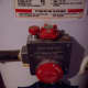 The temperature control is the large dial in the front of this component. The burner control is on top. Notice the notch in the knob and the indicator stamped in the steel at "12 o'clock. It is now in the "on" position.
