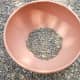 Choose a container and fill it with about one inch of gravel. This will help improve drainage.