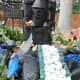 I used an old bridge from an aquarium set over my moat of blue aquarium rocks.