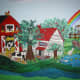 My son's favorite part of the wall was the rainbow that stretched between the farm and city. He also liked to name the animals.