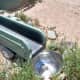 Rainwater Capture - The bowl you see here is a sieve leading to a silt filter pipe that descends to a buried cistern. All Earthship roofs are curved to direct rainwater toward the sieves and their cisterns.