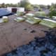 Half of the roof is cleaned off, ready for new felt.