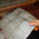 Cutting the Vinyl Tiles with A Pair of Scissors 