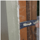Use a pry bar to remove drywall.