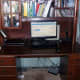 The desk, prior to refinishing. The included shelving above was one reason to keep it, but did need removed.