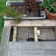 Two decking planks removed to gain access for cabling and strengthening the sub-frame.