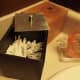 Small brown box used for Q-tip storage.