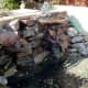 Natural stones to create waterfall as a new water feature, c2011.