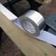 Self-adhesive aluminium tape used as a reflective surface for the LED strip lighting.