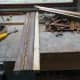 Timber frame pieces cut to size and ready for cleaning up prior to reassembly.