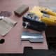 Marking out and cutting the skirting board and door step profiles with the aid of a profile gauge.