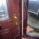 Bell wire next to new door frame ready to feed though predrilled hole to the outside.