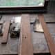 All the rotten pieces laid-out next to pieces of hardwood of the same thickness and depth.