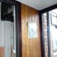 Bell wire now concealed behind wood panelling and in mini-ducting above new windows.